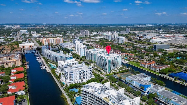 bird's eye view featuring a view of city and a water view