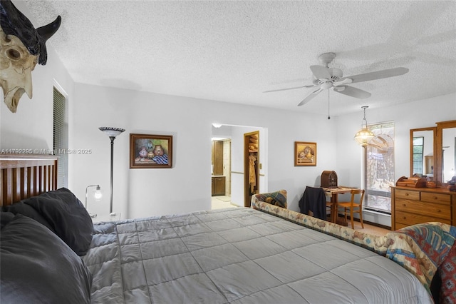8261 SW 186th St, Cutler Bay, FL 33157 - laundry area featuring cabinet space, separate washer and dryer, light tile patterned floors, a textured ceiling, and crown molding