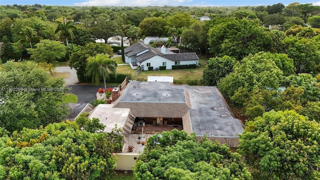 aerial view with a wooded view