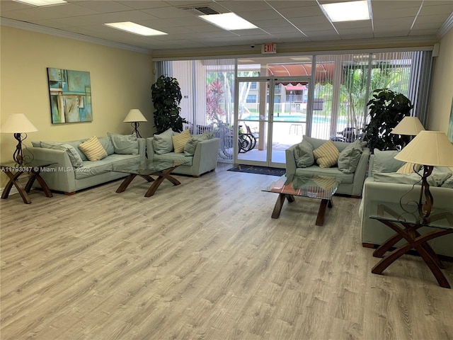 13120 SW 92nd Ave Unit B-222, Miami, FL 33176 - living area featuring ornamental molding and wood finished floors