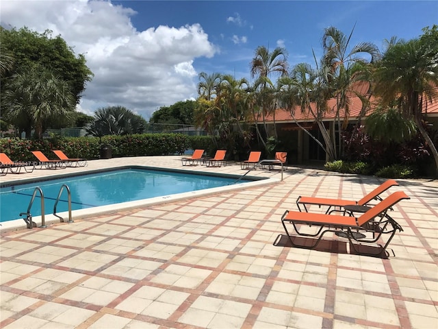 13120 SW 92nd Ave Unit B-222, Miami, FL 33176 - community pool with a patio area and fence