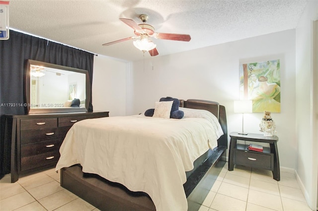 8023 Lake Dr Unit 201, Doral, FL 33166 - bedroom with baseboards, a textured ceiling, ceiling fan, and light tile patterned floors