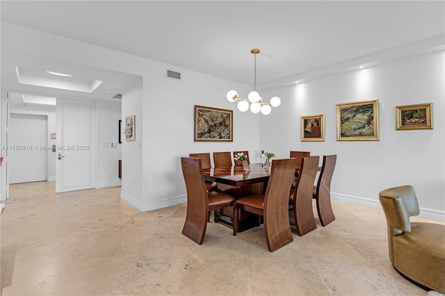 727 Crandon Blvd Unit 401, Key Biscayne, FL 33149 - dining area with visible vents, baseboards, a tray ceiling, and a notable chandelier