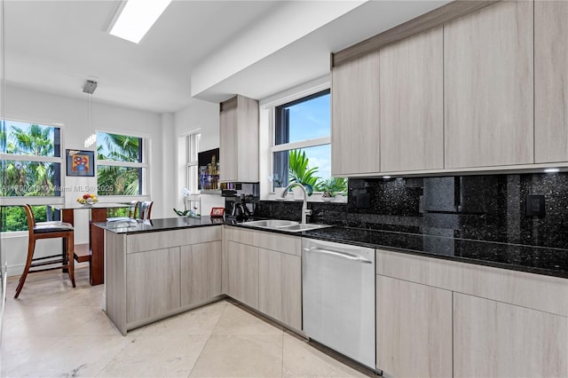 727 Crandon Blvd Unit 401, Key Biscayne, FL 33149 - kitchen with a peninsula, modern cabinets, a sink, dark stone countertops, and dishwasher