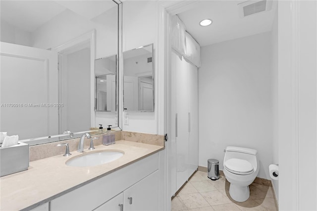 727 Crandon Blvd Unit 401, Key Biscayne, FL 33149 - bathroom with tile patterned flooring, vanity, toilet, baseboards, and visible vents