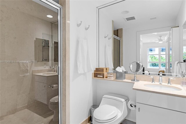 727 Crandon Blvd Unit 401, Key Biscayne, FL 33149 - bathroom with vanity, toilet, a ceiling fan, a shower stall, and visible vents