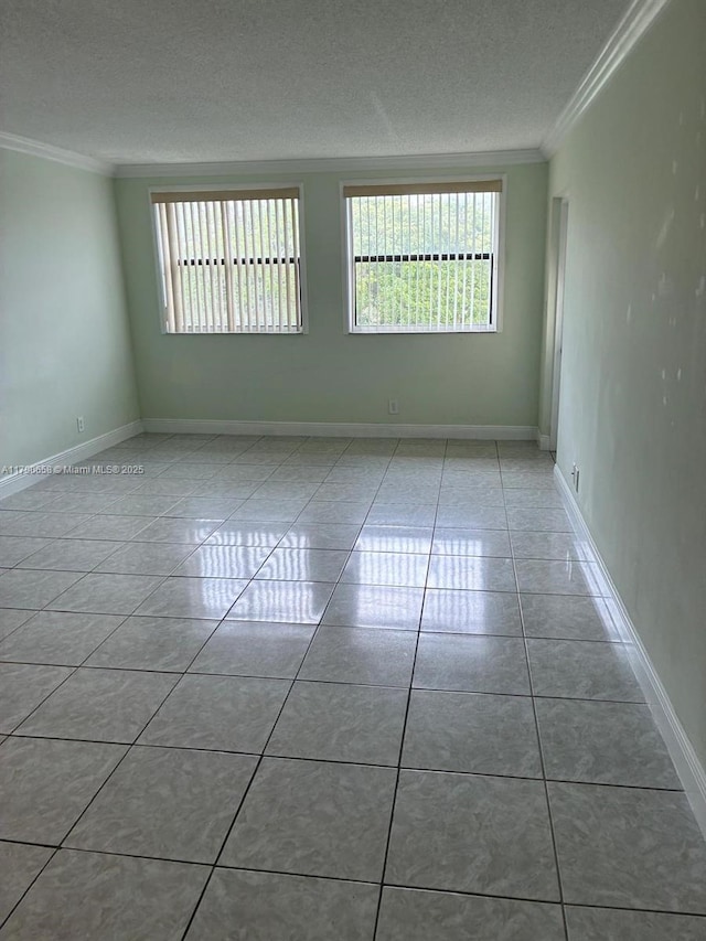 8120 Geneva Ct Unit 551, Doral, FL 33166 - tiled empty room featuring baseboards, ornamental molding, and a textured ceiling