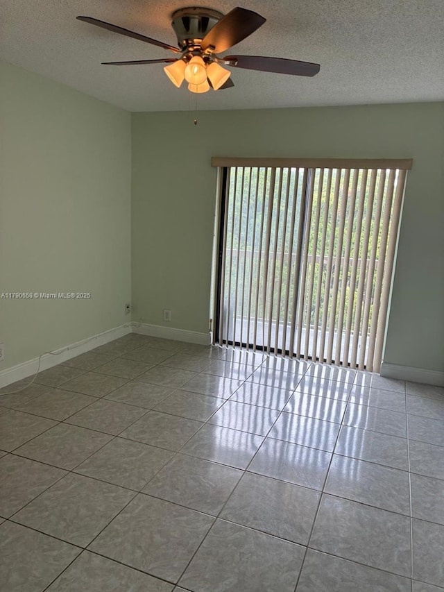 8120 Geneva Ct Unit 551, Doral, FL 33166 - tiled spare room featuring a textured ceiling, ceiling fan, and baseboards