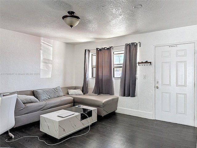 14320 NE 18th Ave, Miami, FL 33181 - living room featuring baseboards, a textured ceiling, a textured wall, and dark wood finished floors