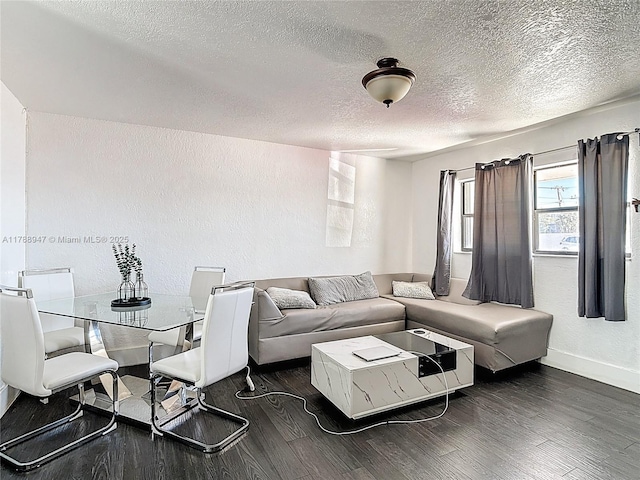14320 NE 18th Ave, Miami, FL 33181 - living room with a textured ceiling, a textured wall, baseboards, and dark wood-type flooring