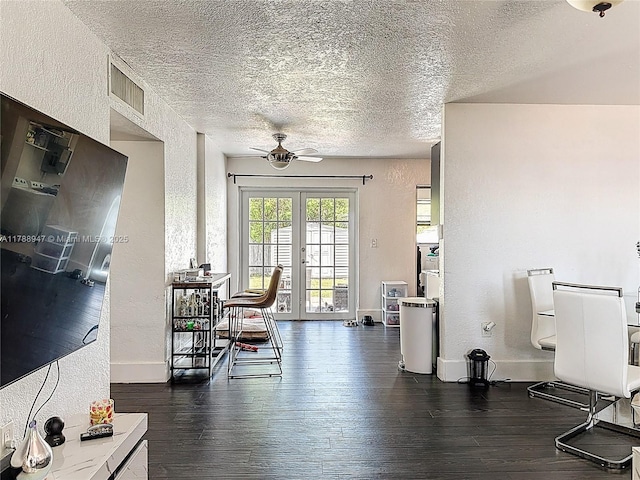 14320 NE 18th Ave, Miami, FL 33181 - interior space featuring visible vents, a textured wall, ceiling fan, dark wood-type flooring, and a textured ceiling