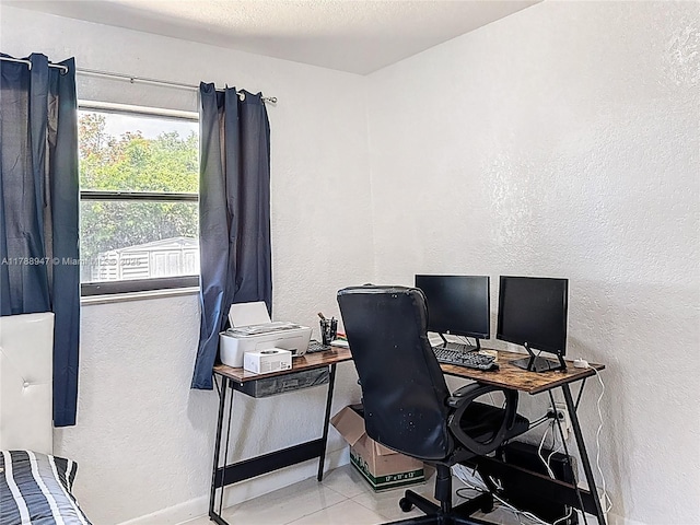 14320 NE 18th Ave, Miami, FL 33181 - office area featuring a textured wall, baseboards, and tile patterned floors