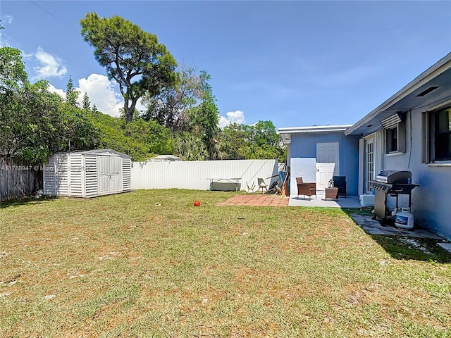 14320 NE 18th Ave, Miami, FL 33181 - view of yard with a fenced backyard, an outdoor structure, a patio area, and a storage shed