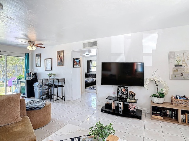 14320 NE 18th Ave, Miami, FL 33181 - tiled living area with ceiling fan, visible vents, and baseboards