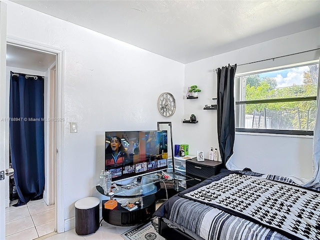 14320 NE 18th Ave, Miami, FL 33181 - bedroom with tile patterned flooring and baseboards