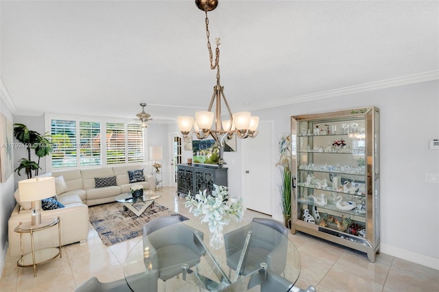 dining room with an inviting chandelier, baseboards, crown molding, and light tile patterned flooring