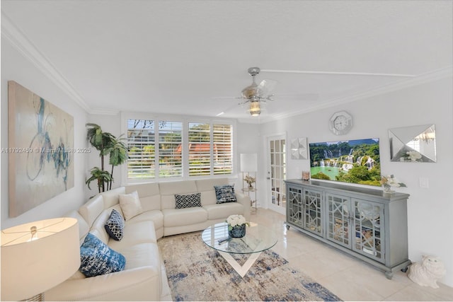 tiled living area with french doors, ornamental molding, and a ceiling fan