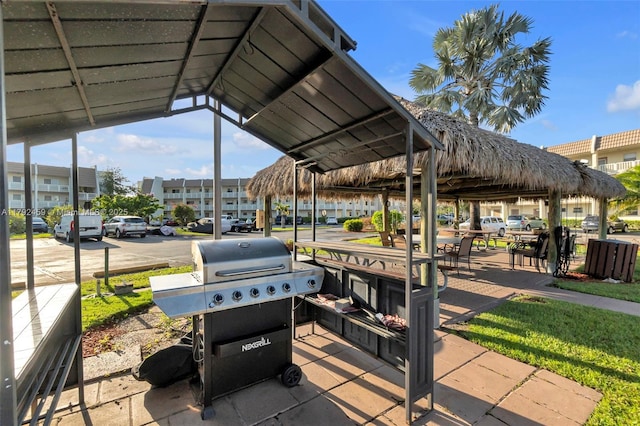 view of patio / terrace featuring a gazebo and grilling area
