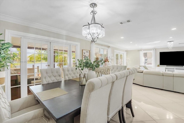 1820 Vista Way, Margate, FL 33063 - dining room with visible vents, ornamental molding, an inviting chandelier, recessed lighting, and french doors