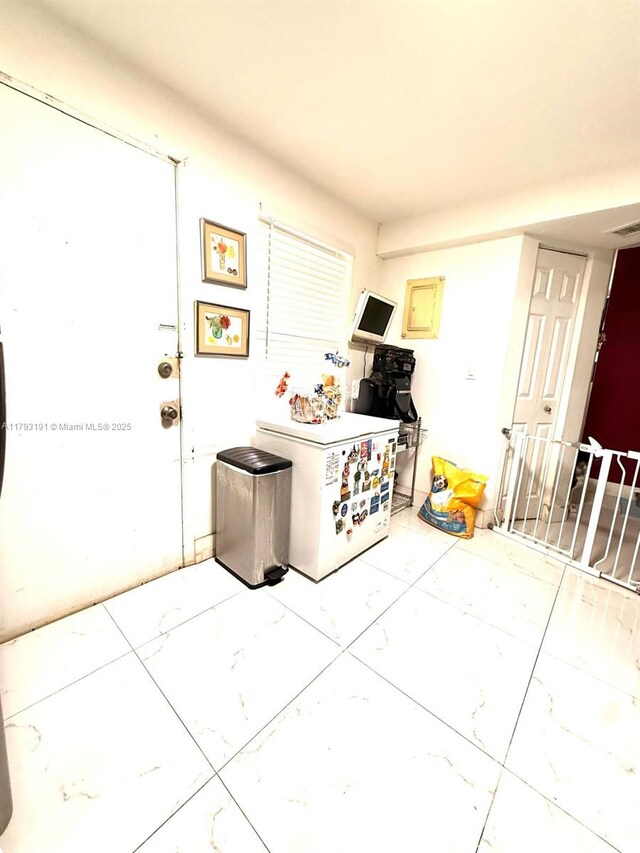 1401 NE 191st St Unit D201, Miami, FL 33179 - interior space with marble finish floor
