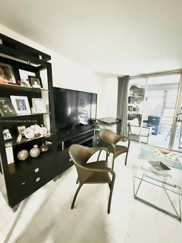 1401 NE 191st St Unit D201, Miami, FL 33179 - living area with marble finish floor