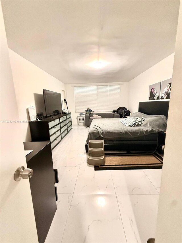 1401 NE 191st St Unit D201, Miami, FL 33179 - bedroom featuring marble finish floor