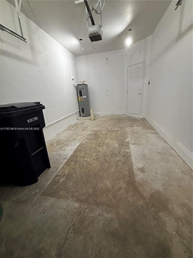 garage with water heater and a garage door opener