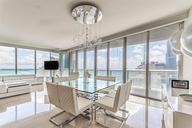 495 Brickell Ave Unit 2801, Miami, FL 33131 - sunroom / solarium featuring an inviting chandelier