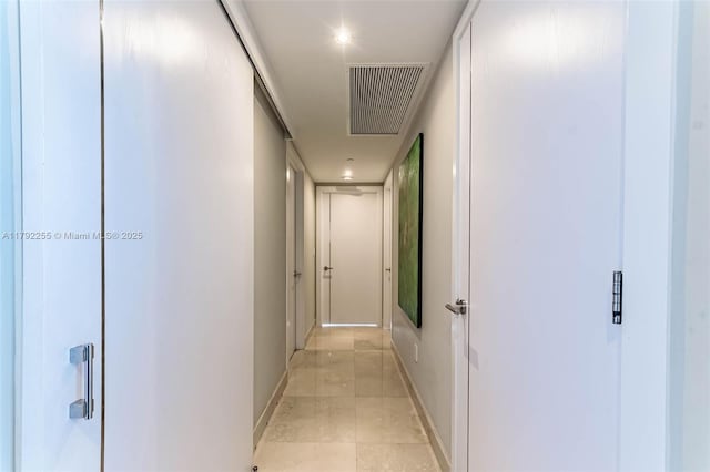 495 Brickell Ave Unit 2801, Miami, FL 33131 - hallway with baseboards and visible vents