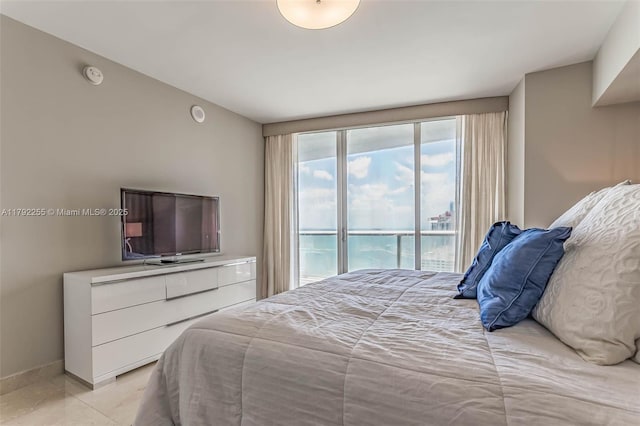 495 Brickell Ave Unit 2801, Miami, FL 33131 - bedroom with access to outside and baseboards