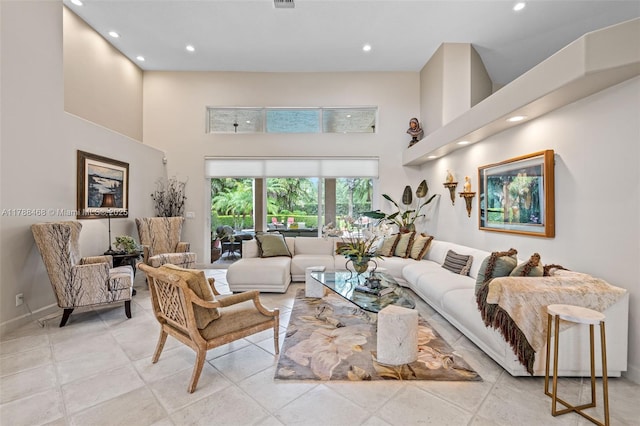 10605 Indian Trl, Cooper City, FL 33328 - living room with recessed lighting, baseboards, and a towering ceiling