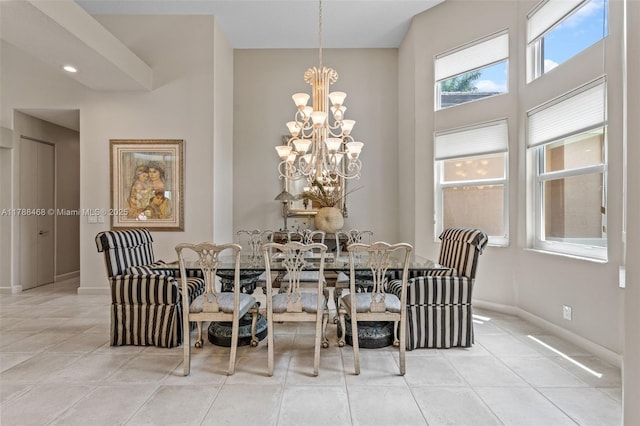 10605 Indian Trl, Cooper City, FL 33328 - dining area featuring an inviting chandelier, baseboards, and light tile patterned floors