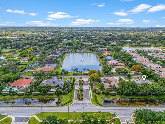 10605 Indian Trl, Cooper City, FL 33328 - drone / aerial view with a water view and a residential view