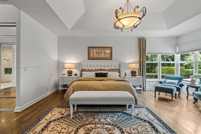 10605 Indian Trl, Cooper City, FL 33328 - bedroom featuring baseboards and wood finished floors