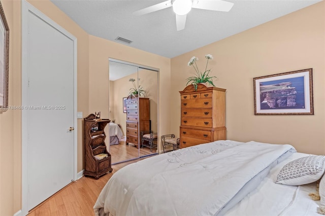 10605 Indian Trl, Cooper City, FL 33328 - bedroom featuring a ceiling fan, visible vents, baseboards, a closet, and light wood-style flooring