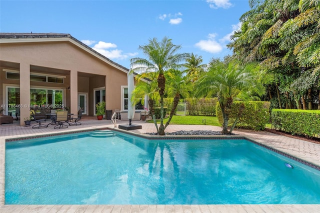 10605 Indian Trl, Cooper City, FL 33328 - view of swimming pool with a patio, a fenced in pool, and fence