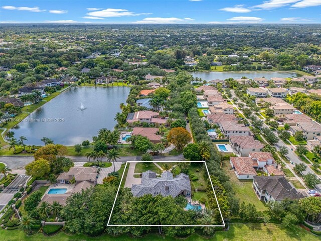 10605 Indian Trl, Cooper City, FL 33328 - aerial view with a residential view and a water view