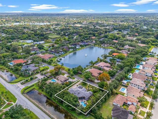 10605 Indian Trl, Cooper City, FL 33328 - bird's eye view with a water view and a residential view