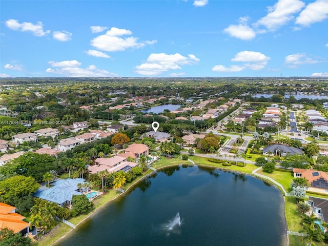10605 Indian Trl, Cooper City, FL 33328 - drone / aerial view featuring a water view and a residential view