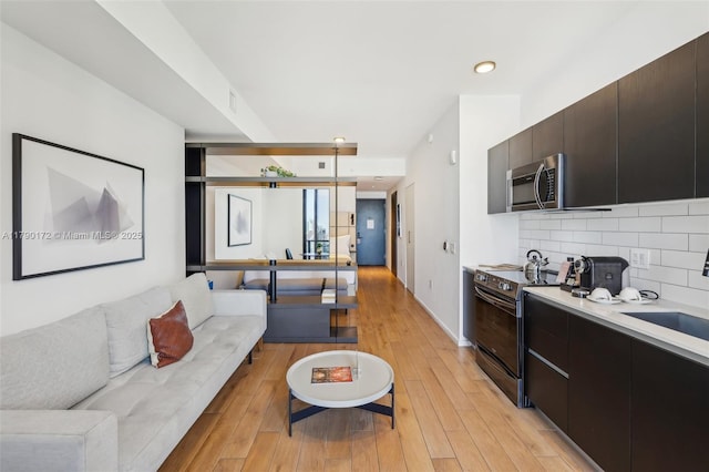 398 NE 5th St Unit 1805, Miami, FL 33132 - living room featuring recessed lighting and light wood-style flooring