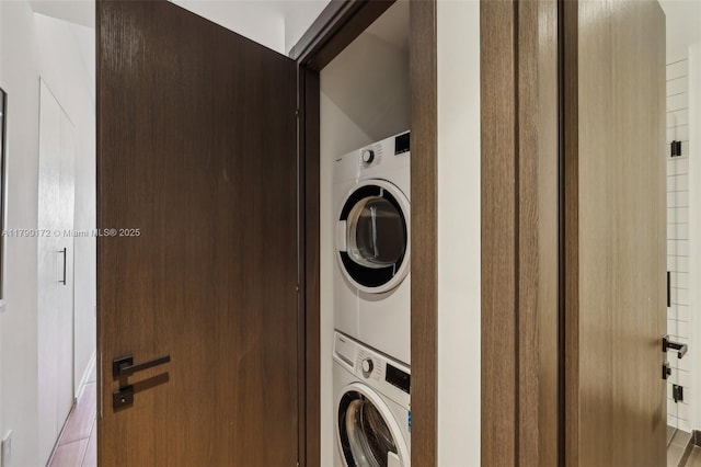 398 NE 5th St Unit 1805, Miami, FL 33132 - laundry room with laundry area, stacked washer / dryer, and tile patterned flooring
