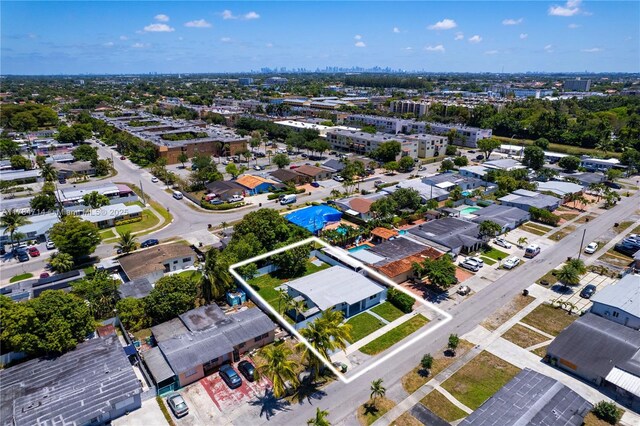 5397 W 14th Ct, Hialeah, FL 33012 - drone / aerial view featuring a city view