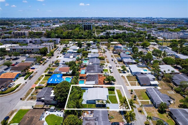 5397 W 14th Ct, Hialeah, FL 33012 - drone / aerial view featuring a city view