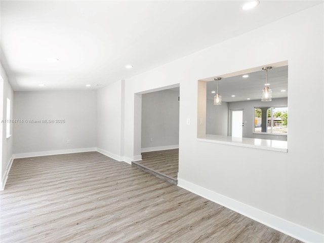 5397 W 14th Ct, Hialeah, FL 33012 - washroom featuring laundry area, light wood finished floors, baseboards, and washing machine and clothes dryer