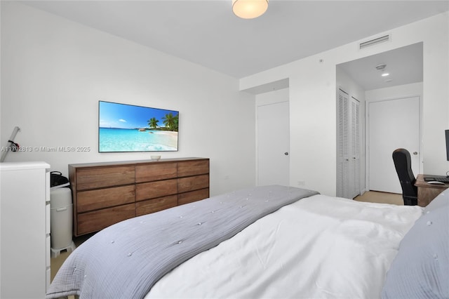 801 Brickell Key Blvd Unit 3105, Miami, FL 33131 - bedroom featuring visible vents and a closet