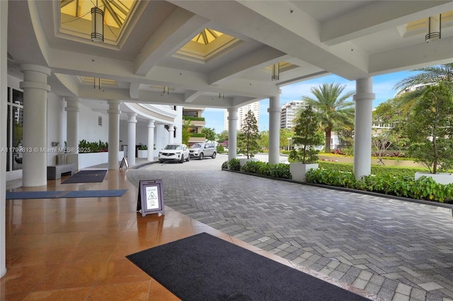 801 Brickell Key Blvd Unit 3105, Miami, FL 33131 - view of patio featuring driveway and a carport