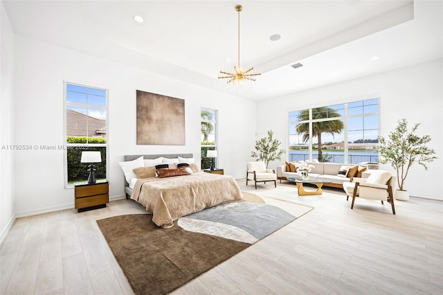 4991 E Sterling Ranch Cir, Davie, FL 33314 - bedroom with a chandelier, multiple windows, light wood-style flooring, baseboards, and recessed lighting