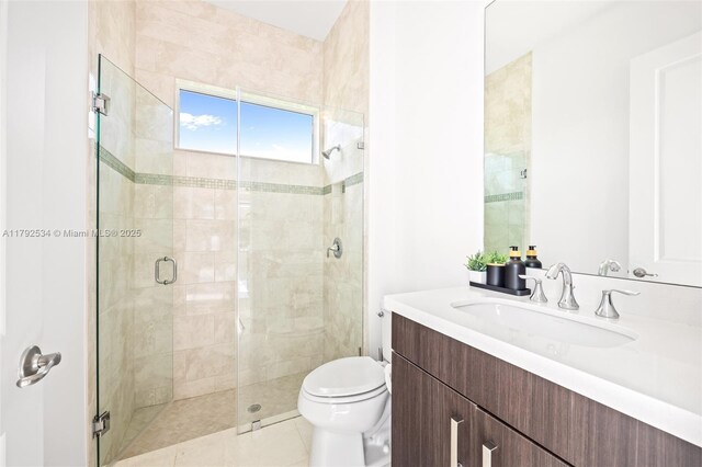 4991 E Sterling Ranch Cir, Davie, FL 33314 - bathroom with toilet, vanity, and a stall shower