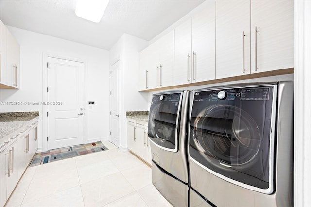 4991 E Sterling Ranch Cir, Davie, FL 33314 - laundry room with cabinet space, washer and dryer, and baseboards
