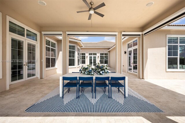 4991 E Sterling Ranch Cir, Davie, FL 33314 - view of patio / terrace with french doors, outdoor dining area, and ceiling fan